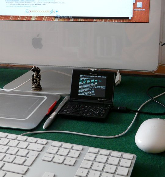 My nanonote, dwarfed by the iMac.